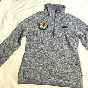 Patagonia 1/4 zip sweater with Chi Omega crest embroidery